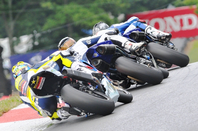 Josh Hayes leads Ben Bostrom and Tommy Hayden over the rise of Mid-Ohio's turn five in the American Superbike race on July 19. (Larry Lawrence photo)