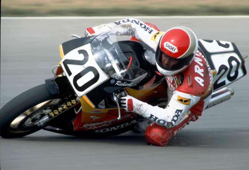 Arnaiz - Topeka 1991-sm Rich Arnaiz flicks the Commonwealth Honda into a turn at Heartland Park Topeka at the AMA Superbike race there in 1991. Note the sparks flying off Arnaiz' knee puck. (Larry Lawrence photo)