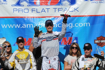 Peoria - podium Wiles holds up five fingers for five straight Peoria TT wins. (Larry Lawrence photo)
