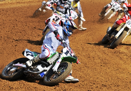 Peoria - Wiles Henry Wiles leads the pack going into turn one at the start of the second lap. (Larry Lawrence photo)