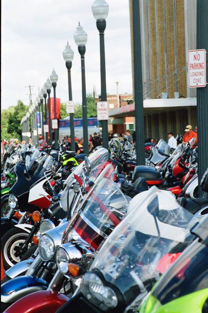 Indy Mile riders Riders lined up their bikes under the old-fashioned lamp posts at the Indiana State Fairgrounds as they gather for the Indy Mile. (Larry Lawrence photo)