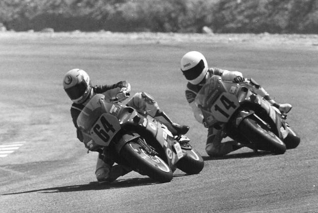 Edwards-Koyama Colin Edwards (64) and Takanobu Koyama (14) race in a WERA Future Stars event at Willow Springs Raceway in April of 1991. (Larry Lawrence photo)