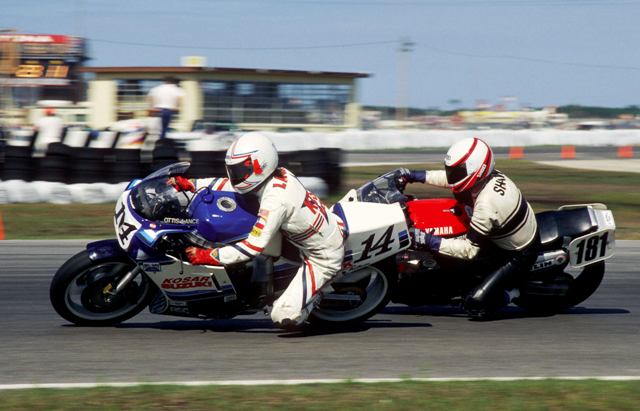 Lance v Shaw Ottis Lance (14) and Rick Shaw (181) battle during the 1987 Daytona 200. (Larry Lawrence photo)