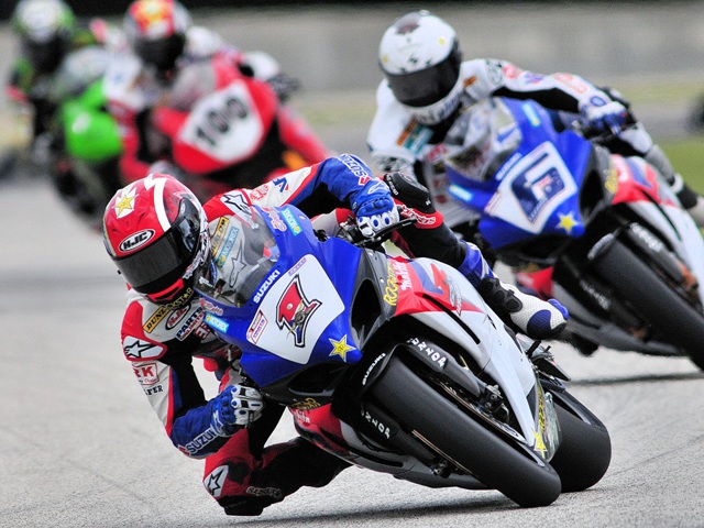 Spies 1-sm Ben Spies (1) leads Mat Mladin (6) and Neil Hodgson (100) at a round of the 2008 AMA Superbike Championship at Road America. (Larry Lawrence photo)