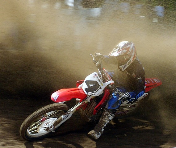 Ricky Carmichael gets sandblasted by the roost of another rider on the famous deep sand of Southwick in 2004. (Larry Lawrence photo)