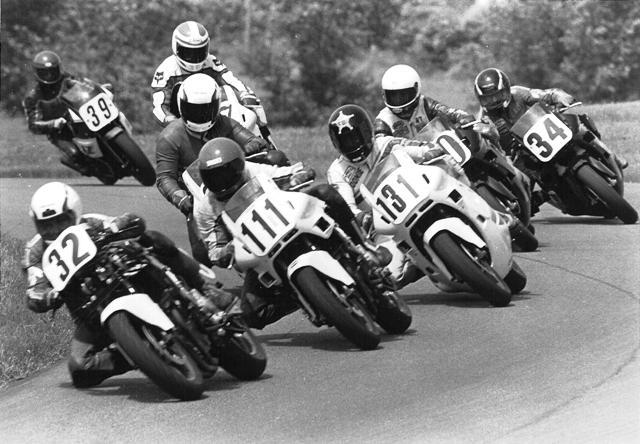 A shot of a WERA race at Grattan taken an instant before Chris Corven (behind bike#111) crashed setting up a multi-rider chain reaction crash. (Larry Lawrence photo)