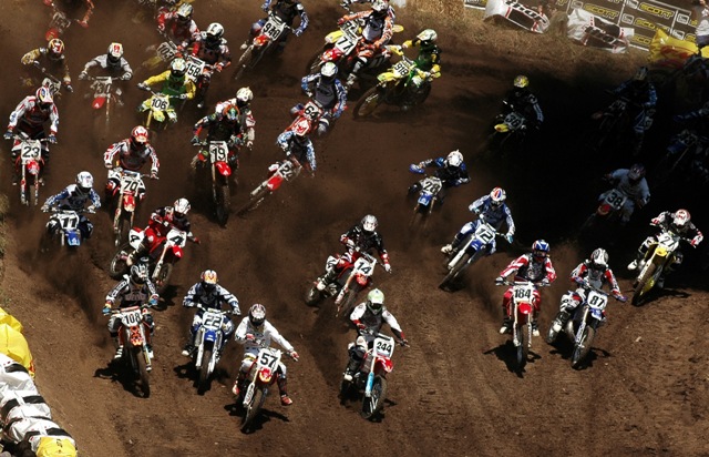 Washougal 250 m1 start-sm Joseph Oehlhof (57) nails the holeshot at the start of an AMA Motocross National in Washougal, Washington, in 2004. (Larry Lawrence photo)