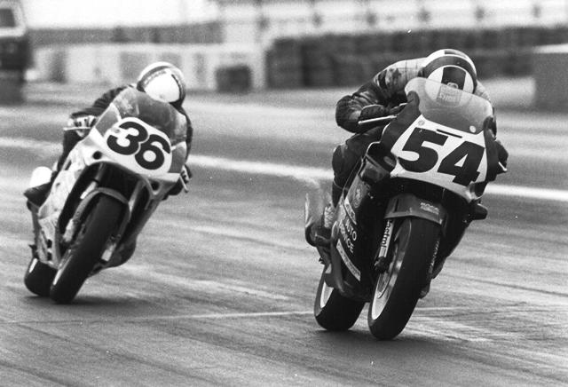 Mark Kowalski leads Bruce Baldus on the final lap of a WERA B Production race coming onto the front straight at Indianapolis Raceway Park. (Larry Lawrence photo)