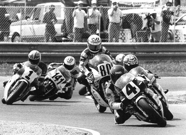 Randy Renfow (4) on the Vance & Hines Honda leads a tightly knit group that included Alan Carter (directly behind Renfrow), John Kocinski (80), Donnie Greene (1), Cal Rayborn III (141) and I believe Kork Ballington following Rayborn. (Larry Lawrence photo)