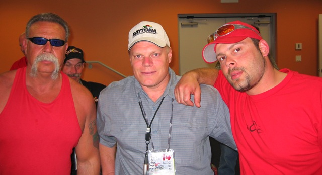 From left to right - Paul Teutul Sr., Larry Lawrence and Paul Teutul Jr. in the Daytona International Speedway media center in 2004.