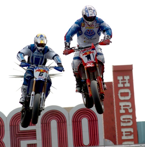 Jeff Ward (1) and Mark Burkhart (6) battle in AMA Supermoto action on the downtown streets of Reno in 2005. Burkhart won the race. (Larry Lawrence photo)