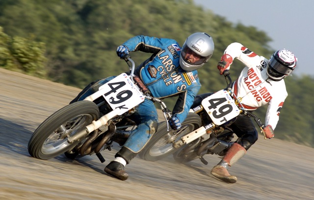Boehlke, Kurt-sm Kurt Boehlke (49T) and Jon Cornwell (49T) race in practice for the AMA Grand National on the I-96 Half-Mile in Lake Odessa, Michigan. (Larry Lawrence photo)