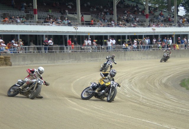 Greenville Logan Myers (24) and Tim Eades (72) broad slide the cushion on the Greenville (Ohio) Half-Mile at Darke County Fairgrounds during practice for the 2008 AMA Grand National. (Larry Lawrence photo)