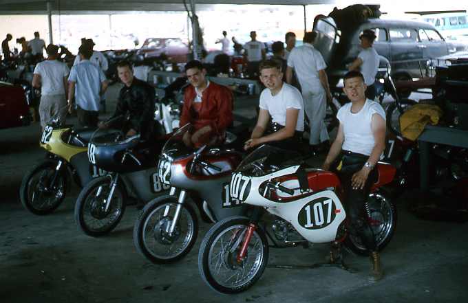 DAYTONA PITS 3 (From left to right) Joe Wirthheymer, Torello Tacchi, Tom Houston and Gabe Rudavicius pose for a photo in the garage area during Bike Week at Daytona International Speedway in 1965. (Torello Tacchi collection)
