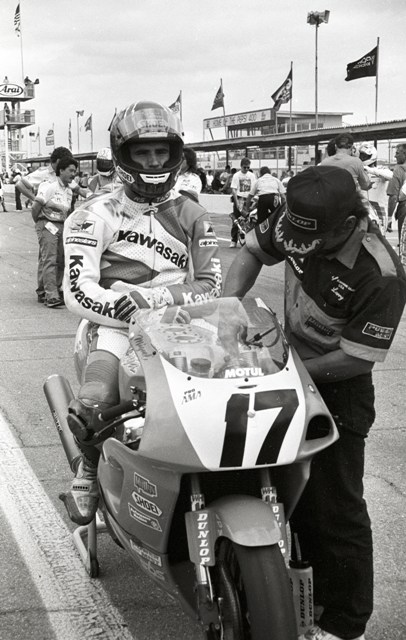 Duhamel - Daytona '93 -sm Miguel Duhamel's Kawasaki ZX-7 gets final adjustments from his mechanic as he readies for the 1993 Daytona 200.