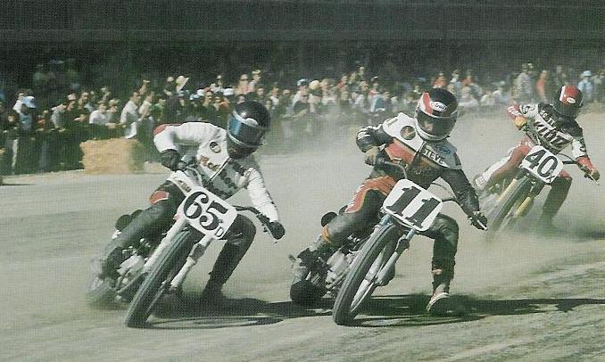 Steve Eklund (11) has the inside line on Floridian Billy Labrie (65D) in an AMA Grand National in 1979. Just behind Eklund and Labrie is Scott Parker on bike 40X. Eklund went on to win the Grand National Championship. Parker and Labrie were both rookie experts that season. (AMA Media Kit Photo)