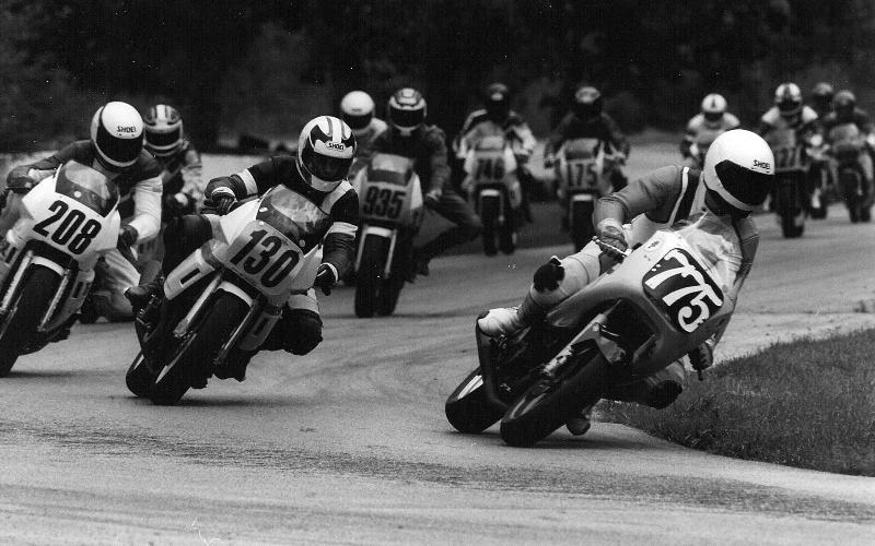 Lang, Charles Charles Lang (775) put his Ducati out front early in a early 1990s WERA D Superbike Novice race at Blackhawk Farms. Reuben Frankenfield (935) eventually worked his way through to the front to win the race. (Larry Lawrence photo)