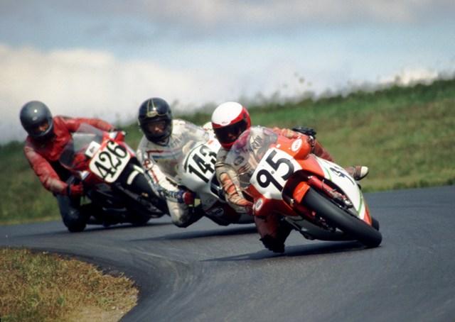 Morrison, Martin - Grattan 1986-sm Martin Morrison, riding his No. 95 Suzuki RG500, leads Steve Arnold (143) on a Yamaha TZ500 and an unidentified rider on a Suzuki GSXR in a WERA sprint race at Grattan Raceway in 1986. (Larry Lawrence photo)