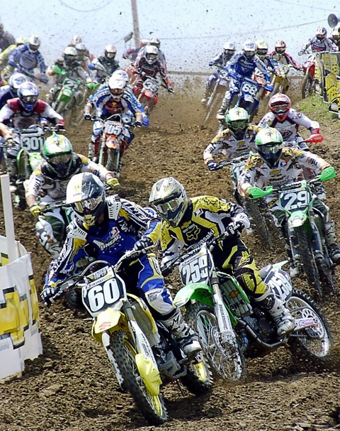 Broc Hepler (60), of Kittanning, Pa., leads James Stewart (259) and the rest of the pack at the start of the AMA Chevrolet 125cc Motocross Championship race at High Point Raceway in Mt. Morris, Pa. Stewart, of Haines City, Fla., won the race on a Kawasaki and extend his points lead in the series standings. (Larry Lawrence photo)