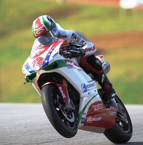 Pegram - Rd Atl 09 Larry Pegram, on the Foremost Insurance Ducati, crests the hill after the back straight at Road Atlanta this past summer during the American Superbike race. (Larry Lawrence photo