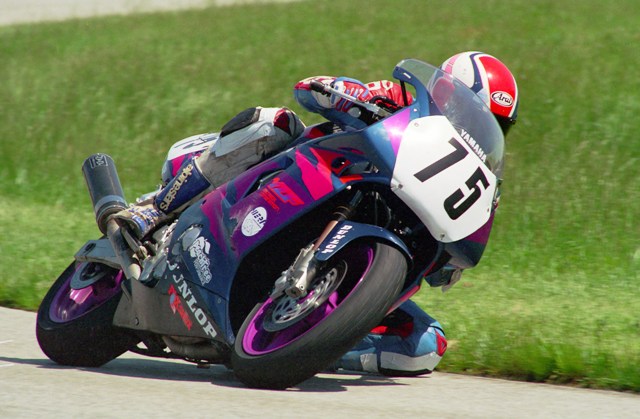 Eisenacher, Billy - Putnam Park 1995 Billy Eisenacher, who quietly became one of the leading factory contingency winners in club racing during the 1990s, leans into a turn with his Yamaha at Putnam Park Road Course in May of 1995. (Larry Lawrence photo)
