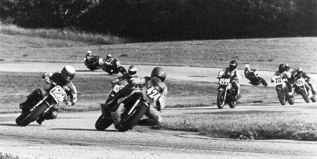 Fardoux, kevin Kevin Fardoux (424) got a killer start in a D Superbike race at Grattan sometime in the mid-1980s. Here Fardoux, on a Yamaha RZ350, leads Lance David (122), who was riding a Yamaha XT600-based road racer. (Larry Lawrence photo)