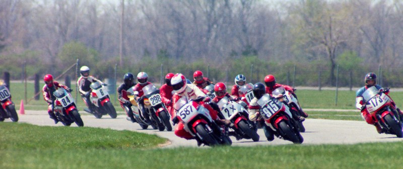 Knapp - IRP 1986 Dave Knapp leads a large pack of riders through the treacherous Carousel turn at Indianapolis Raceway Park during a WERA National Endurance race in 1986. (Larry Lawrence photo)