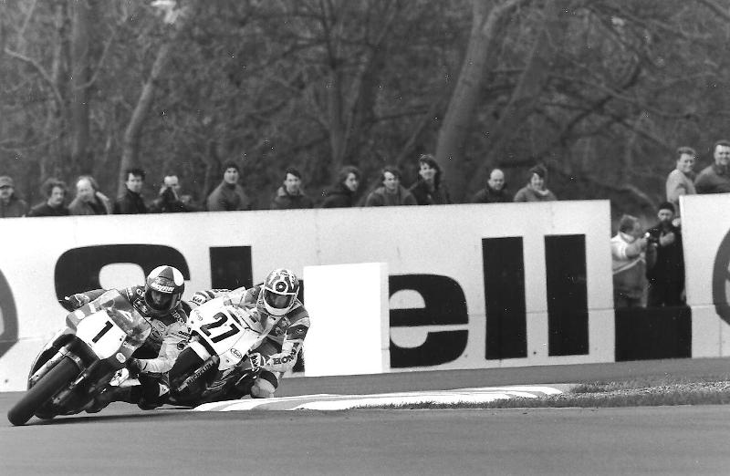 Two of the all-time greats of World Superbike, Fred Merkel (1) and Carl Fogarty (27) battle in World Superbike competition in 1990. (Kel Edge photo)