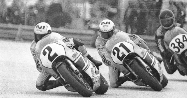 Yamaha teammates Kenny Roberts (2) and Eddie Lawson (21) battle in the 1983 Daytona 200. Roberts won the race. Oldrich Schmuttermeier (384) is being lapped. (Photo courtesy Daytona International Speedway)