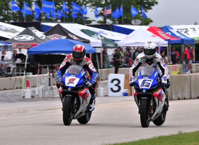 Ben Spies (1) and Mat Mladin (6) brake hard for turn one at Road America during the AMA Superbike race there in 2008. Both riders are heavy on the binders and if you look closely you can even see daylight beneath Mladin's rear tire. (Larry Lawrence photo)