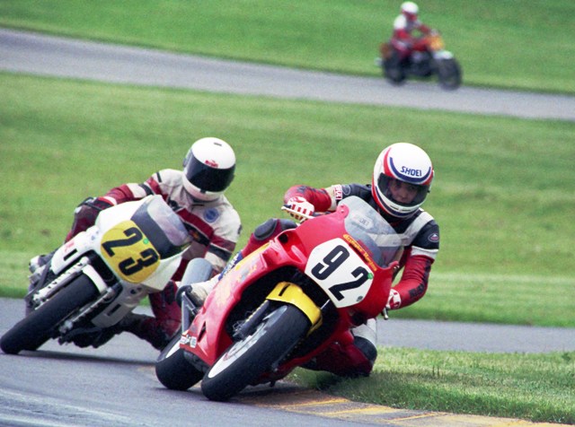 Arclight Racing - 1991 A rider for Arclight Racing dabs his knee in the grass at Grattan Raceway during a WERA National Endurance race there in 1991. (Larry Lawrence photo)