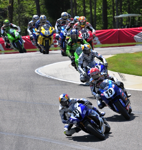 Herrin - Barber '08 Josh Herrin, on the Graves Motorsports Yamaha, leads Blake Young (79), Ben Bostrom (behind Young) and the rest of the pack in the 2008 Barber Motorsports Park AMA Supersport race. Herrin took the exciting victory in a last-lap duel with teammate Bostrom. (Larry Lawrence photo)