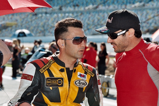 Karimian, Reno - 2009 Daytona 007 -sm Reno Karimian (left) talks with fellow racer Johnny Rock Page before the start of the 2009 Daytona Superbike race. (Larry Lawrence photo)
