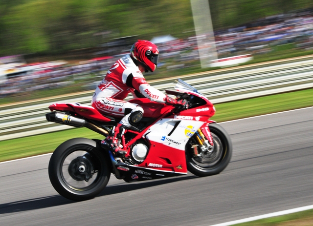 Pegram - nosedive The front end on Larry Pegram’s Ducati takes a nosedive under heavy braking in a Formula Xtreme race at Barber Motorsports Park in 2006. (Larry Lawrence photo)