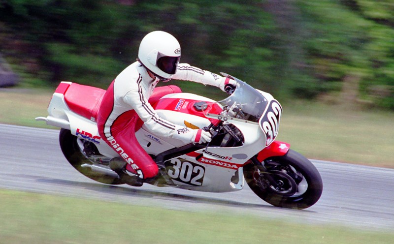 Roos, Cam - Roebling 7-86 Cam Roos racing his stunning Honda NSR250 at Roebling Road at a WERA event in July of 1986. Notice the rear tire catching air. The mystery is why? (Larry Lawrence photo)