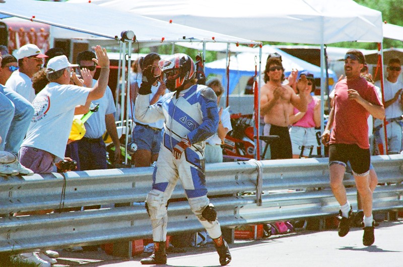 Watchers on the pit wall applauded for a rider who got up and was unhurt after crashing in a WERA race at Putnam Park sometime in the mid-1990s. (Larry Lawrence photo)