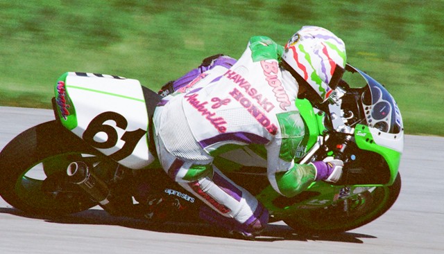 Scott Brown has a stylish riding technique as he corners his Kawasaki of Nashville-sponsored ZX-7 during a WERA race at Putnam Park Road Course sometime in the mid-1990s. (Larry Lawrence photo)