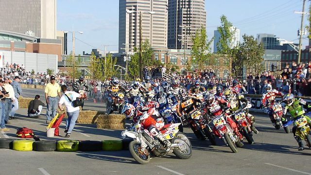 Columbus SuMo 2003 Jeremy McGrath leads the pack into the first turn in the AMA Red Bull Supermoto race in downtown Columbus in October of 2003. (Larry Lawrence photo)