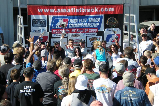 Coolbeth - Monticello '08 Kenny Coolbeth (center) holds up the trophy for winning the AMA Grand National at Monticello Raceway on Sept. 7, 2008. (Larry Lawrence photo)