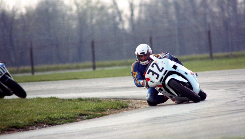 Gibson, Gary - IRP 4-87 Gary Gibson illustrates the maximum lean angle capability of the 1987 Honda CBR600 Hurricane in a WERA race at Indianapolis Raceway Park in April of 1987. (Larry Lawrence photo)