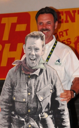 Jack Penton standing behind a cutout of his famous father John, who founded Penton Motorcycles, during the Penton 40th Anniversary Reunion in 2008. (Larry Lawrence photo)