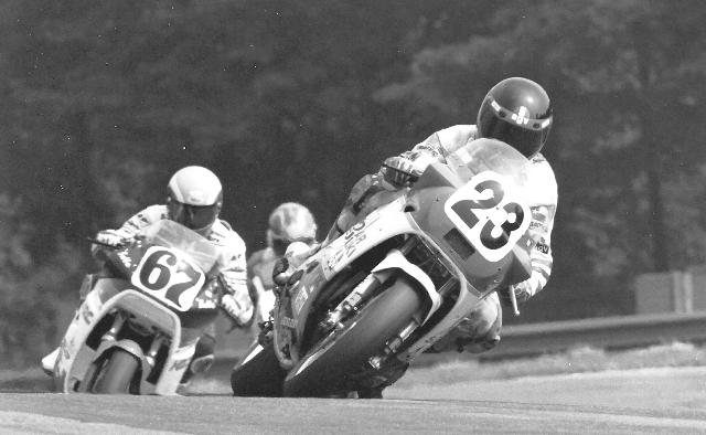 Polen - Mid-O Doug Polen, riding the Kosar Racing Suzuki at the Mid-Ohio Superbike race in 1987, leads the factory Honda of Bubba Shobert, while Doug Chandler can just be seen coming up behind Shobert. (Larry Lawrence photo)