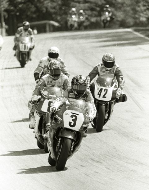 Randy Renfrow, racing a Honda CBR600 in the 750 Supersport race, leads a pack of riders braking for turn five at Road America in June of 1994. (Larry Lawrence photo)