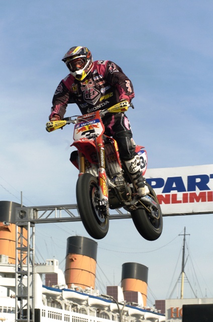 Ward - Queen Mary , Jeff Ward, jumps his Honda at the AMA Supermoto Championship final held at the Queen Mary Docks in Long Beach, Calif., on Sunday, Nov. 5, 2006. The Queen Mary can be seen in the background. Ward clinched the championship. It was the second AMA Supermoto title for the 45-year-old from Newport Beach, Calif. (Larry Lawrence photo)