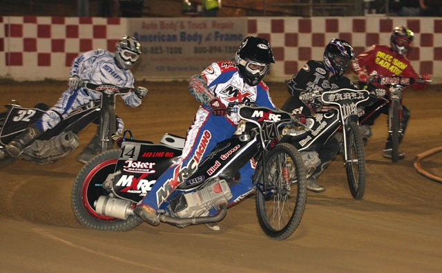 Billy Janniro (front) leads riders out of a turn in a heat race at Fast Friday's earlier this season. Janniro will be the man to beat Friday night when 16 of the nation's best speedway riders will compete in the opening round of the AMA/USA Speedway National Championship at the Gold Country Fairgrounds in Auburn. (Michael Kirby photo)