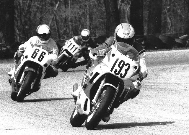 Schmidt - Blackhawk Andy Schmidt had a dream day at Blackhawk Farms in May of 1989, winning three Yamaha-paying WERA sprint races. Here Schmidt accelerates out of a turn ahead of Shawn Nicoloff (66) and Dick Koehler (111) en route to winning the regional Formula Xtreme race. (Larry Lawrence photo)