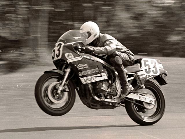 Chivington 1-sm Dan Chivington wheelies his Suzuki GSXR in a Suzuki contingency race at Grattan Raceway in 1986. Chivington scored an upset victory over Doug Polen in the Suzuki GSXR Cup Final that year at the WERA Grand National Finals at Road Atlanta. (Larry Lawrence photo)