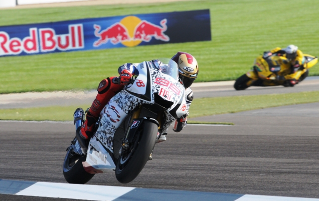 Lorenzo - warmup Jorge Lorenzo was fastest in Sunday morning warm-up for today’s Red Bull Indianapolis Grand Prix. Here the world championship series leader lofts the front wheel on his Fiat Yamaha as he enters Indy’s famous front straightaway. (Larry Lawrence photo)