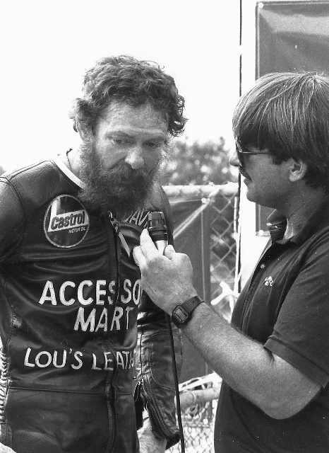 Roper - Chambers Race announcer Rich Chambers interviews longtime vintage machine racer Dave Roper after a race sometime in the early 1990s. (Larry Lawrence photo)