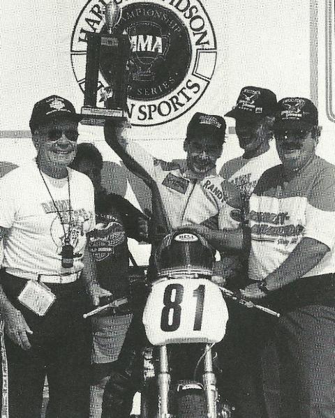Randy Texter celebrates winning the Harley-Davidson 883 Twin Sports Championship at Daytona in 1990. His father “Tex” stands next to him in the white Randy Texter t-shirt. (Courtesy Daytona International Speedway)